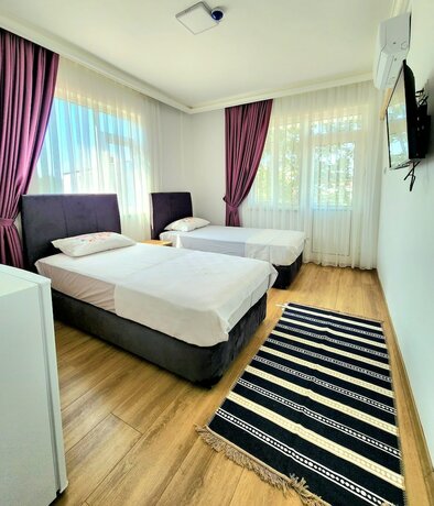 Imagen de la habitación del Asimado Suit Hotel. Foto 14