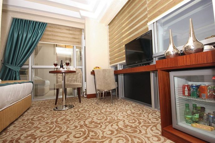 Imagen de la habitación del Asrın Business Hotel. Foto 9