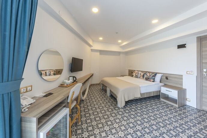 Imagen de la habitación del Assos Altın Otel. Foto 19