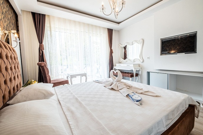 Imagen de la habitación del Assos Ayan Motel. Foto 17