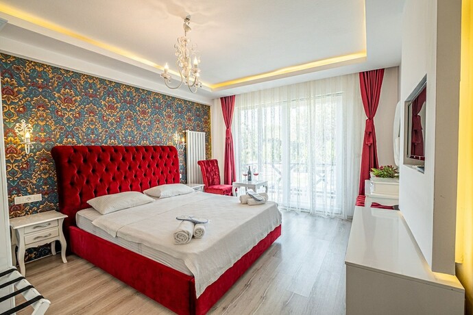 Imagen de la habitación del Assos Ayan Motel. Foto 19