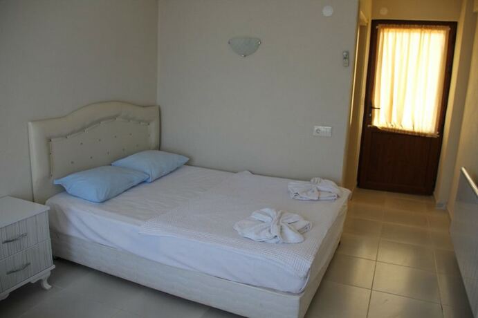 Imagen de la habitación del Assos Bahcivan Motel. Foto 19