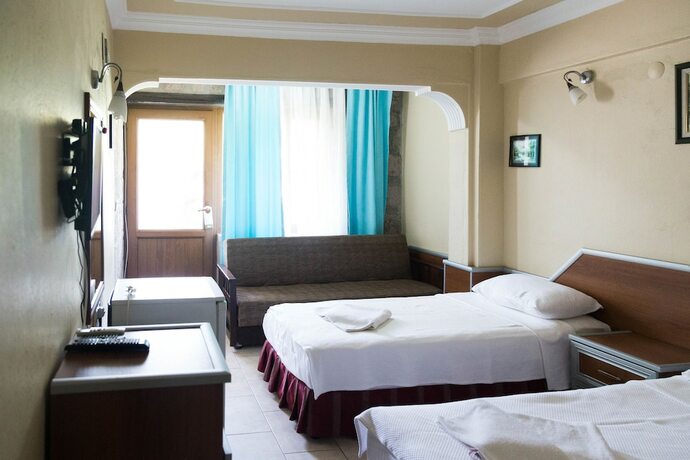 Imagen de la habitación del Assos Kadırga Otel. Foto 11