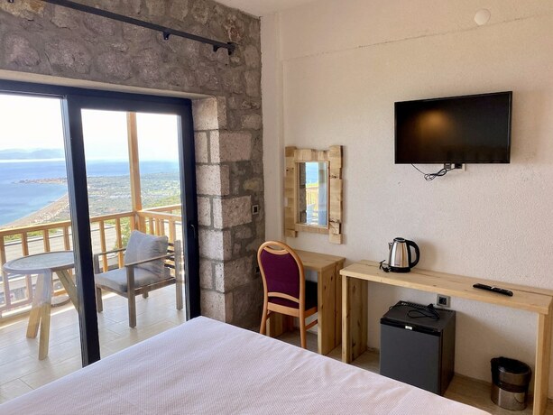 Imagen de la habitación del Assos Karadut Taş Otel. Foto 15