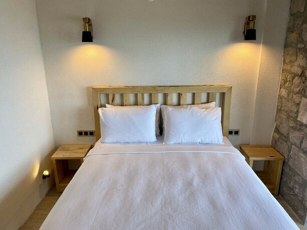 Imagen de la habitación del Assos Karadut Taş Otel. Foto 20