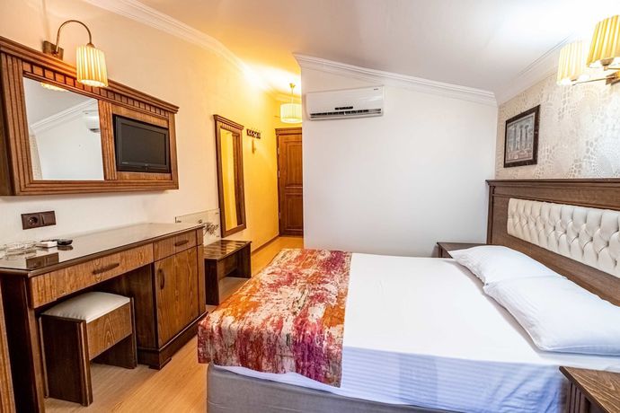 Imagen de la habitación del Assos Kervansaray Hotel - Special Class. Foto 9