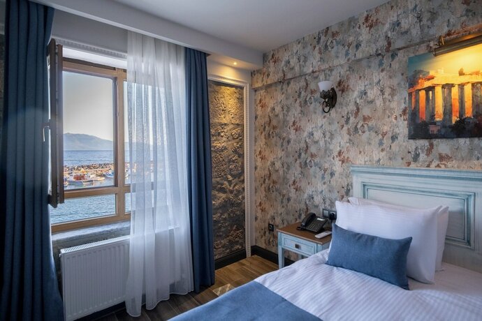 Imagen de la habitación del Assos Troy Port Hotel. Foto 18