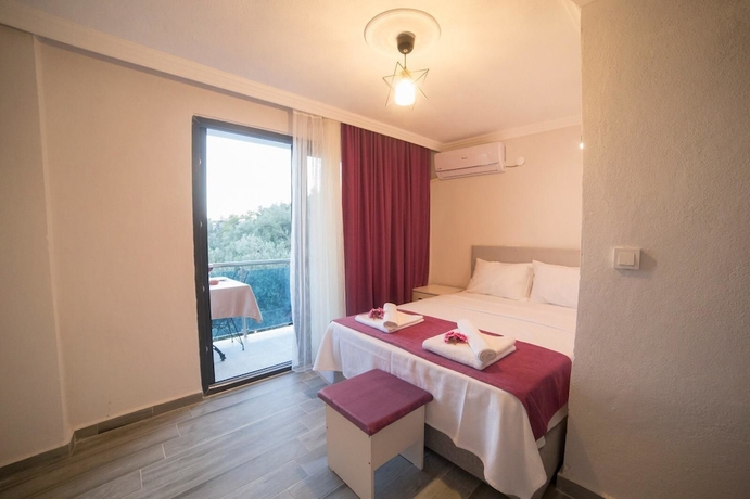 Imagen de la habitación del Assos Yali Butik Otel Restaurant. Foto 10