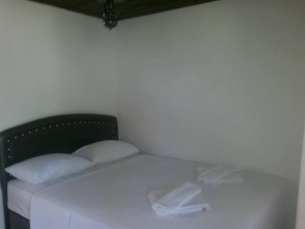 Imagen de la habitación del Assos Yenibahce Motel. Foto 15