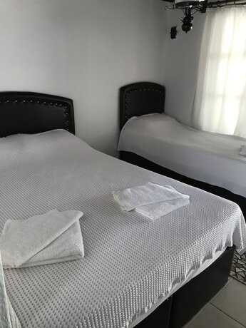 Imagen de la habitación del Assos Yenibahce Motel. Foto 16