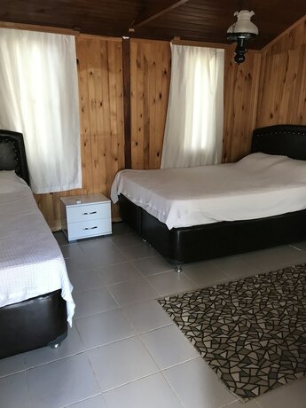 Imagen de la habitación del Assos Yenibahce Motel. Foto 17