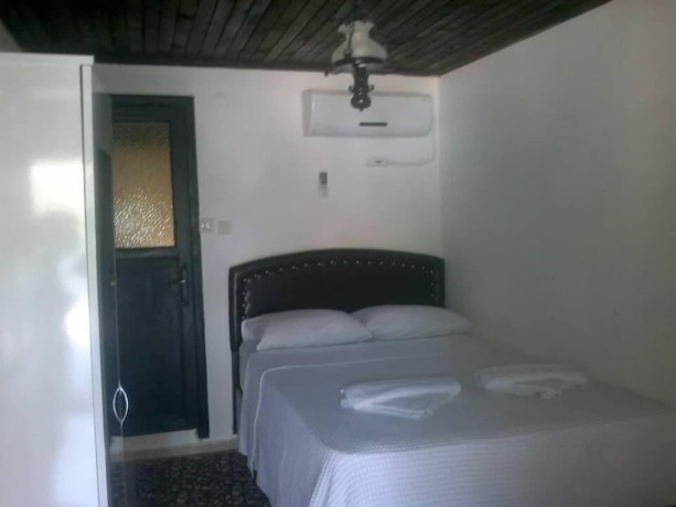 Imagen de la habitación del Assos Yenibahce Motel. Foto 18