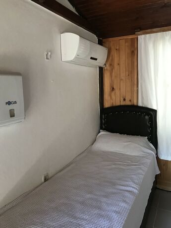 Imagen de la habitación del Assos Yenibahce Motel. Foto 19