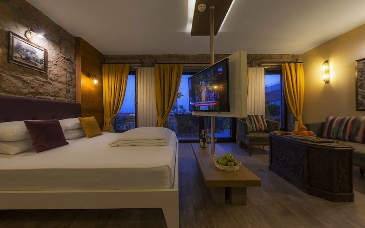 Imagen de la habitación del Assos Zeytin Han Hotel Special Class. Foto 18