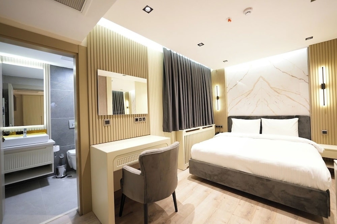 Imagen de la habitación del Assyria Hotel. Foto 4