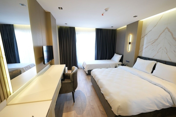 Imagen de la habitación del Assyria Hotel. Foto 5