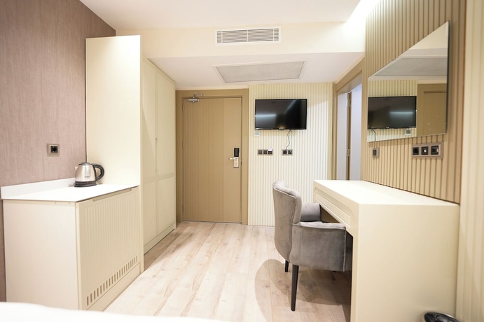 Imagen de la habitación del Assyria Hotel. Foto 7