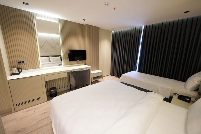 Imagen de la habitación del Assyria Hotel. Foto 11