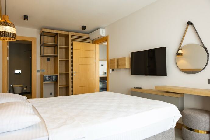 Imagen de la habitación del Asterina Hotel. Foto 13