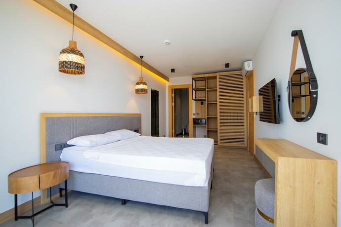Imagen de la habitación del Asterina Hotel. Foto 15