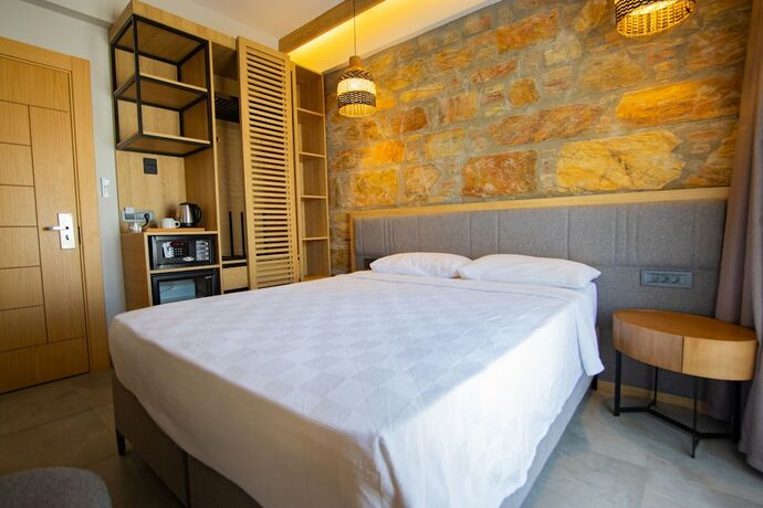Imagen de la habitación del Asterina Hotel. Foto 17