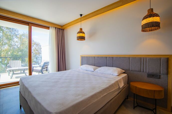 Imagen de la habitación del Asterina Hotel. Foto 18
