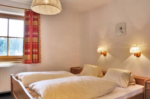 Imagen de la habitación del Astn Hütten - Königsleiten - Ferienwohnungen. Foto 7