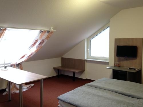 Imagen de la habitación del Astra Hotel Garni. Foto 7