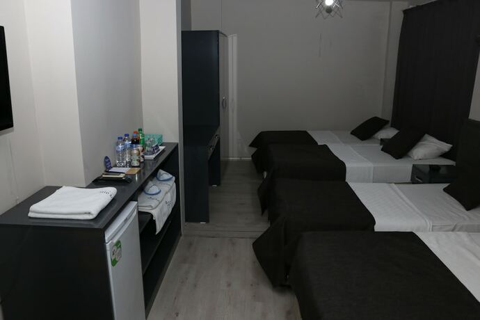Imagen de la habitación del Asus Palmiye Otel. Foto 11