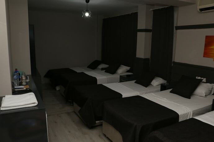 Imagen de la habitación del Asus Palmiye Otel. Foto 13