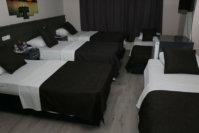 Imagen de la habitación del Asus Palmiye Otel. Foto 17