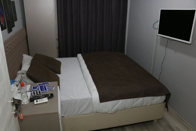 Imagen de la habitación del Asus Palmiye Otel. Foto 19