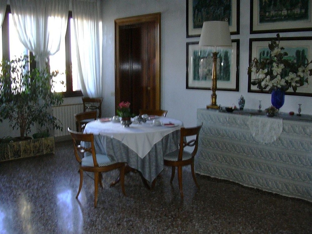 Imagen del bar/restaurante del At Home A Palazzo. Foto 2