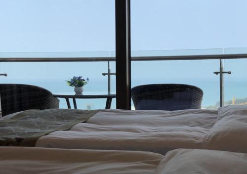 Imagen general del At Home Service Apartment Wanning Shenzhou Bandao. Foto 2