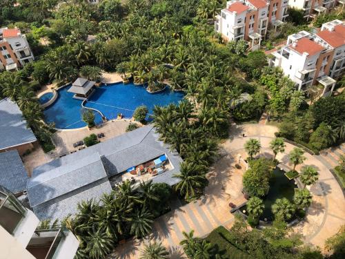 Imagen de la habitación del At Home Service Apartment Wanning Shenzhou Bandao. Foto 8