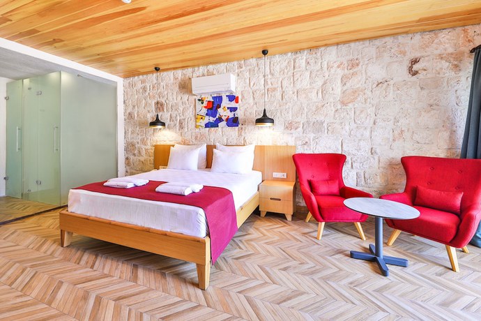 Imagen de la habitación del Atalante Hotel. Foto 12
