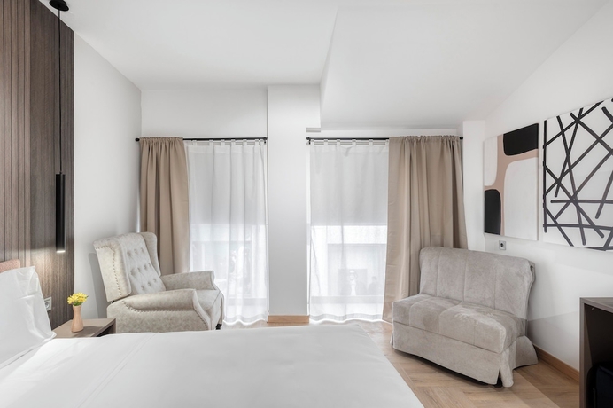 Imagen de la habitación del Athenian Heart Suites. Foto 2