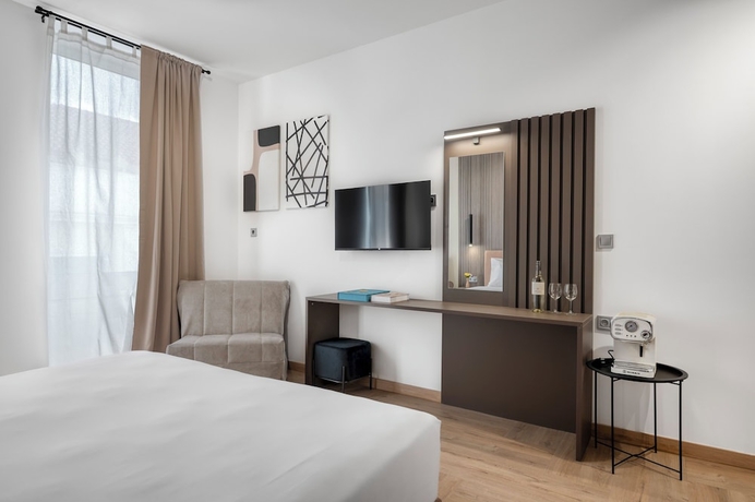 Imagen de la habitación del Athenian Heart Suites. Foto 12