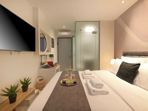 Imagen de la habitación del Athens Eleven Luxury Apartments. Foto 7