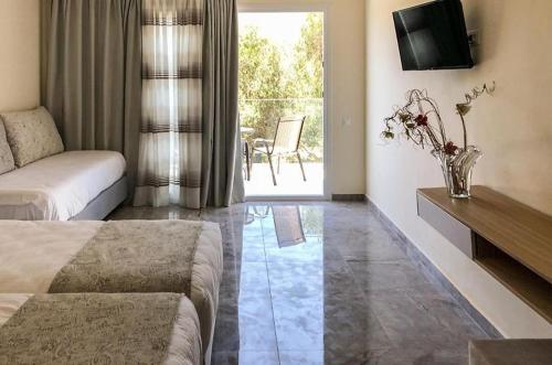 Imagen de la habitación del Athina Hotel. Foto 15