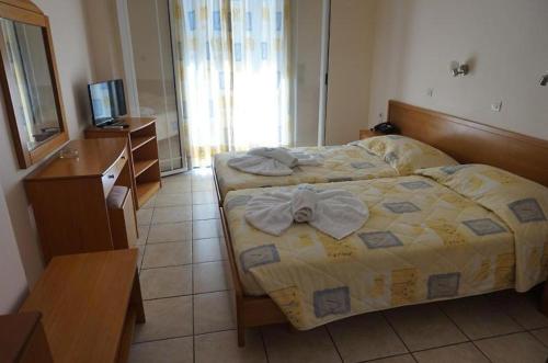 Imagen de la habitación del Athina Hotel. Foto 16