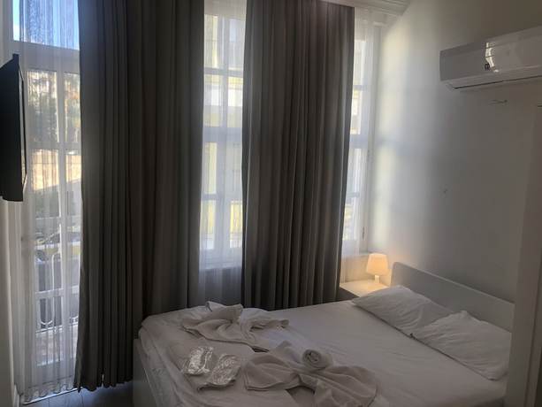 Imagen de la habitación del Atici Hotel. Foto 16