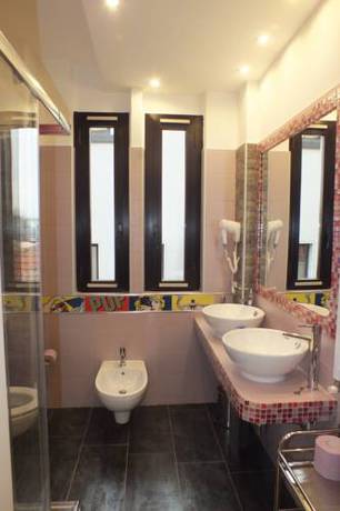 Imagen de la habitación del Atmos Luxe Navigli Hostel and Rooms. Foto 7