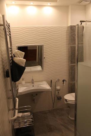 Imagen de la habitación del Atmos Luxe Navigli Hostel and Rooms. Foto 10