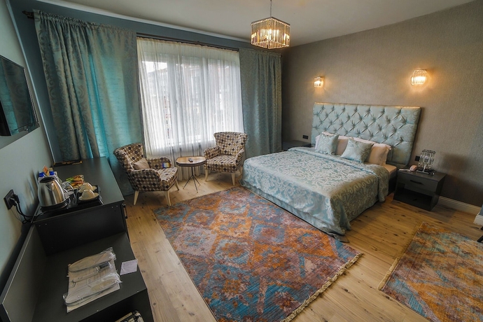 Imagen de la habitación del Atos Otel. Foto 11