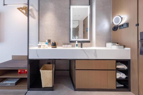 Imagen de la habitación del Atour Hotel Jinan Shungeng Covention and Exhibition Center Bayi Overpass. Foto 13