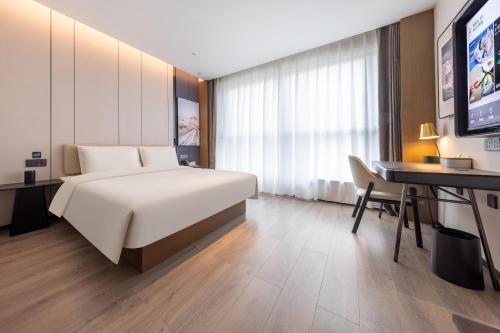 Imagen de la habitación del Atour Hotel Jinan Shungeng Covention and Exhibition Center Bayi Overpass. Foto 16