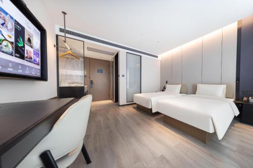 Imagen de la habitación del Atour Hotel Jinan Shungeng Covention and Exhibition Center Bayi Overpass. Foto 17
