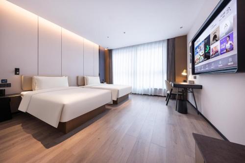 Imagen de la habitación del Atour Hotel Jinan Shungeng Covention and Exhibition Center Bayi Overpass. Foto 18