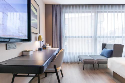 Imagen de la habitación del Atour Hotel Jinan Shungeng Covention and Exhibition Center Bayi Overpass. Foto 19